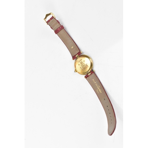 5 - A Cartier 'Must de' Vendome, quartz, ladies, silver gilt wristwatch, having a silvered dial with Ara... 