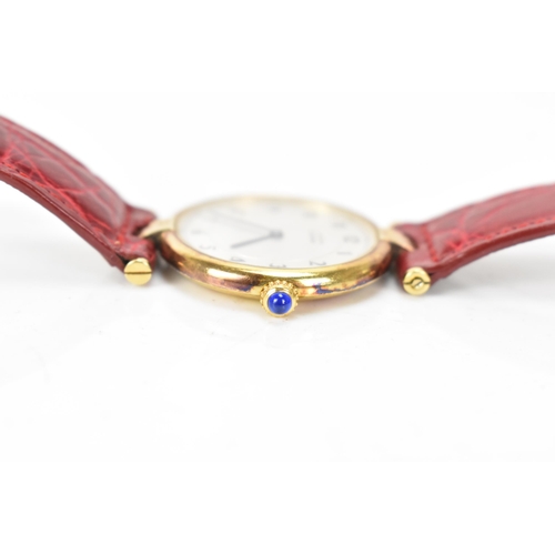 5 - A Cartier 'Must de' Vendome, quartz, ladies, silver gilt wristwatch, having a silvered dial with Ara... 