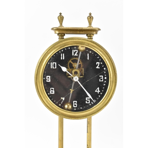 88 - An early 20th century brass gravity clock, possibly by Watson & Webb Kee-less Clock Company, the bra... 