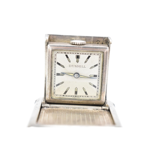 90 - An Art Deco Dunhill silver purse watch, the engine turned case hallmarked 925, numbered DRP 597538, ... 