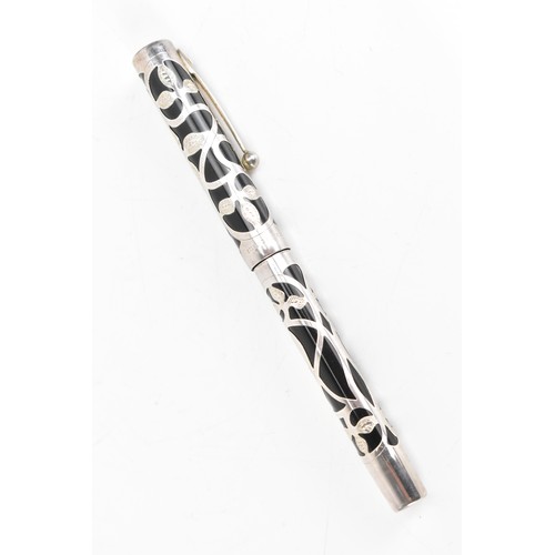 255 - A Sheaffer sterling silver fountain pen, black resin barrel and cap with foliate sterling silver mou... 