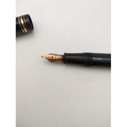 26 - A Conway Stewart no 77 fountain pen with 14ct gold nib in a lady Sheaffer case 
Location: CAB2