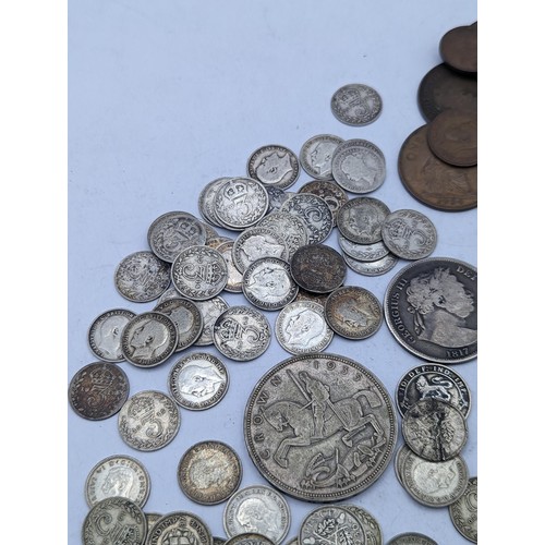 29 - Mixed British coins to include a 1817 'Bull Head' George III half crown, Victorian and later threepe... 