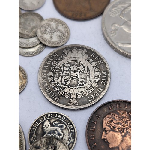 29 - Mixed British coins to include a 1817 'Bull Head' George III half crown, Victorian and later threepe... 