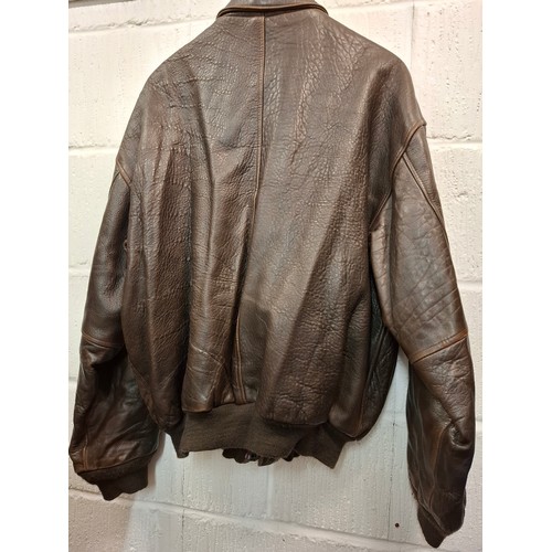 61 - An American Avirex Type A-2 reproduction US Army Air Forces gents brown leather jacket with a Stars ... 