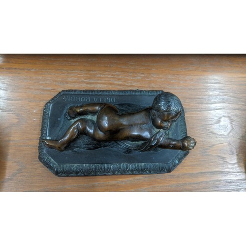 326 - A Bronze painted Grand Tour style sculpture fashioned as a seated boy assigned Austin prod to the ba... 