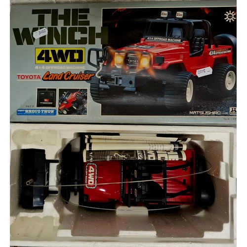 297 - A boxed radio control 'The Wynch 4WD land cruiser', boxed, not tested. Location: AIB
If there is no ... 