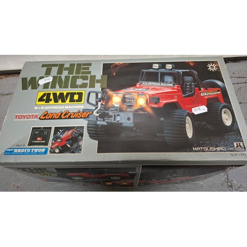 297 - A boxed radio control 'The Wynch 4WD land cruiser', boxed, not tested. Location: AIB
If there is no ... 