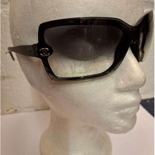 27 - Chanel- A pair of black oversized sunglasses A/F, model:5083 with branded case and box. Location:R2.... 