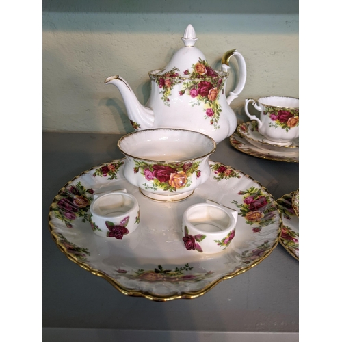 328 - Royal Albert Old Country Roses pattern to include' six side plates, saucers and cups a lidded pot, m... 