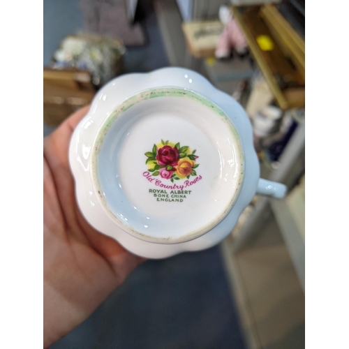 328 - Royal Albert Old Country Roses pattern to include' six side plates, saucers and cups a lidded pot, m... 