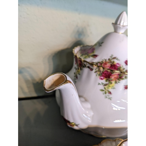 328 - Royal Albert Old Country Roses pattern to include' six side plates, saucers and cups a lidded pot, m... 