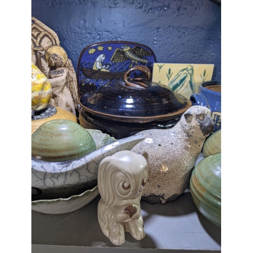 338 - A mixed lot to include studio pottery, a pair of bookends, two pieces of Sylvac pottery, a crackle g... 