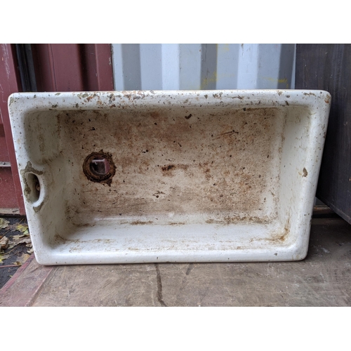 457 - A white/cream ceramic coated sink 75cmw x 46cm x 24cmd (A/F) 
Location CONR
If there is no condition... 