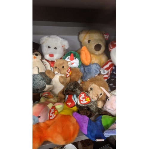 34 - A collection of TY Beanie Bears all still with original tags, to include TY Zodiac Monkey and others... 