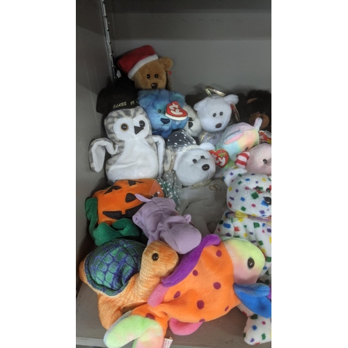 35 - A large collection of TY Beanie Bears, all with original tags, to include Christmas related examples... 