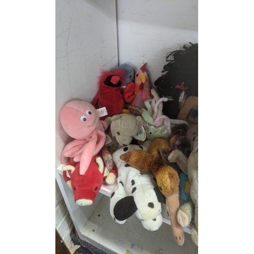 36 - A large collection of TY Beanie Bears, all with original tags, to include Christmas related examples... 