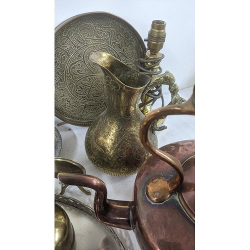 369 - Mixed metalware to include a brass centrepiece fashioned as a swan, brass rococo style double ink we... 