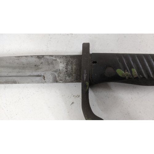 39 - A German Alex Coppel Solingen Bayonet, single edge blade and sheath
Location: A3M
If there is no con... 