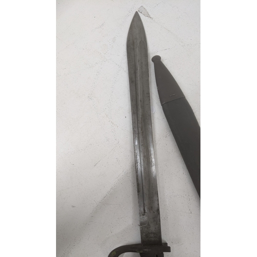 39 - A German Alex Coppel Solingen Bayonet, single edge blade and sheath
Location: A3M
If there is no con... 