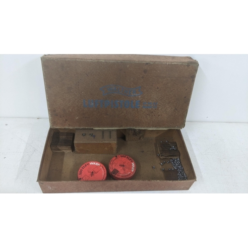 40 - A German boxed Walther 177 model 53 air pistol, stamped 063981, housed in a card box with Eley wasp ... 