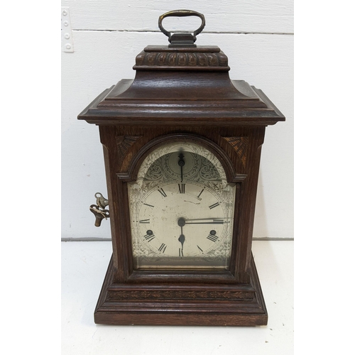 412 - An early 20th century oak cased mantle clock with a Westminster chime
Location RAF
If there is no co... 