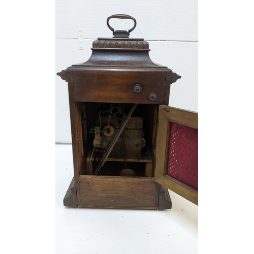 412 - An early 20th century oak cased mantle clock with a Westminster chime
Location RAF
If there is no co... 