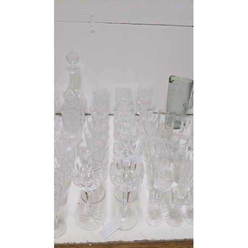 418 - A collection of crystal glassware to include decanters, wine glasses and others
Location: G
If there... 