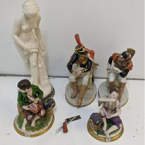 420 - A collection of ceramic figures to include two Rodolph Kammer figures, two Capodimonte soldier figur... 