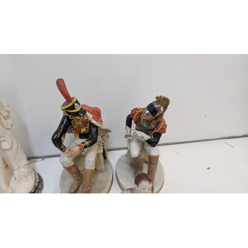 420 - A collection of ceramic figures to include two Rodolph Kammer figures, two Capodimonte soldier figur... 