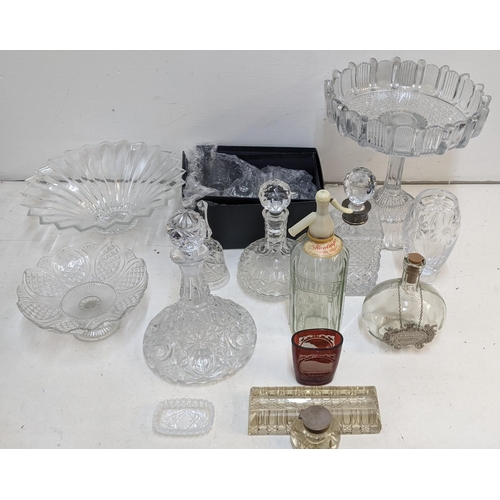 422 - A collection of glassware to include a crystal cut decanter with a silver crown, an inkwell with a s... 