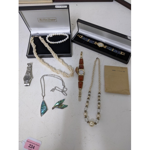 421 - A selection of costume jewellery and ladies wrist watches to include a Yanka Russian watch, gilt met... 