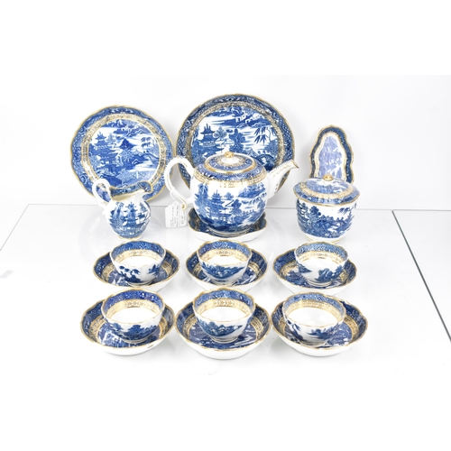 511 - A late 18th century Caughley 'Pagoda' pattern tea service, circa 1785, consisting of a teapot and st... 