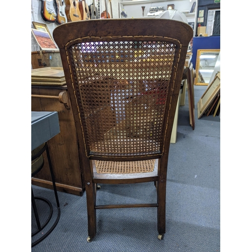 444 - An early 20th century carved, high back nursing chair and a walnut box
Location: RAM
If there is no ... 