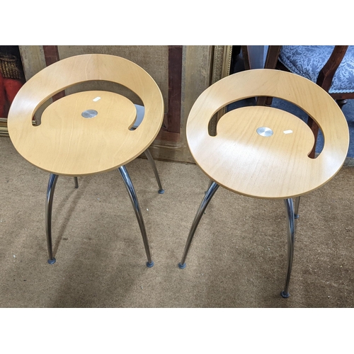 18 - A pair of Magis Lyra beech finished stools on chrome legs 56cm h x 43cm w Location: RAB
If there is ... 