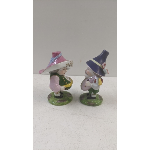 460 - Two 19th century Derby style porcelain House Dwarfs with marks to the base
Location: 4.1
If there is... 