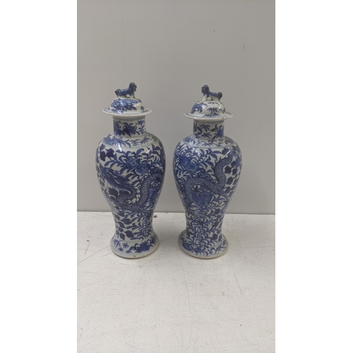 463 - A pair of late 19th century Chinese Kangxi style blue and white vases A/F
Location: R1.1/LWM
If ther... 