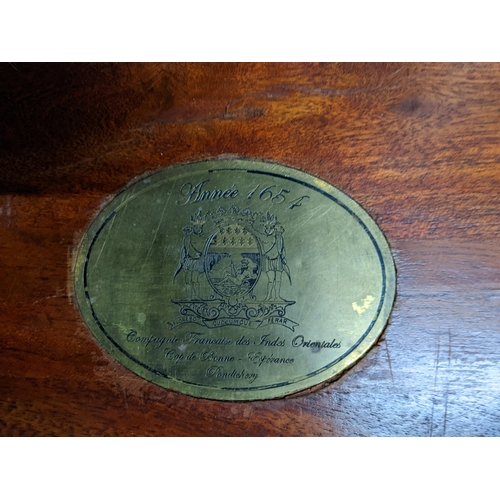 485 - A teak and brass bound chest with brass plaque to the lid having a French inscription 35.5cm x 72cm ... 