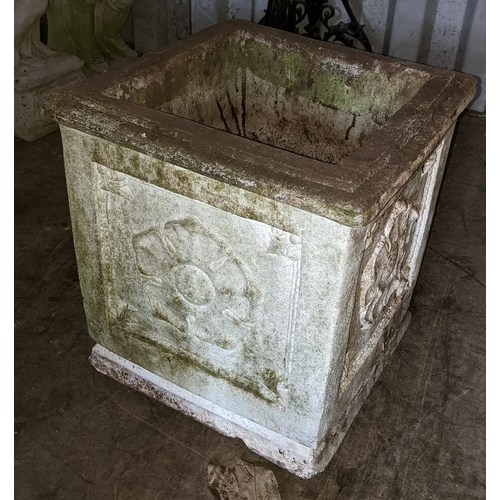 505 - A selection of garden planters to include a stoneware example of square form and cast with flower he... 