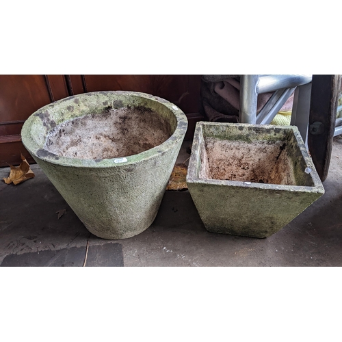 505 - A selection of garden planters to include a stoneware example of square form and cast with flower he... 