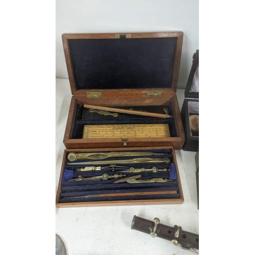 512 - A mixed lot to include W.H Harling London drawing instruments, mixed semi precious stones, trinkets,... 