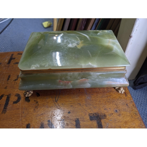 522 - A mixed lot to include a green onyx box with hinged lid, a Royal Worcester boxed Christmas plate The... 