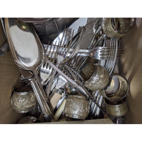 523 - A collection of silver plated cutlery, napkin rings, a teapot and other items Location: 1.3
If there... 