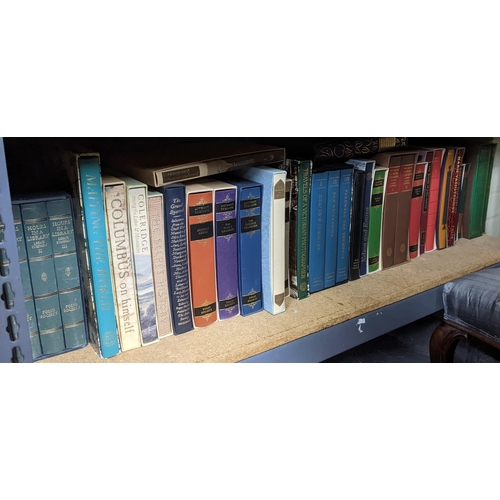 439 - A large collection of cased Folio Society books to include Columbus on Himself, Travels of a Victori... 