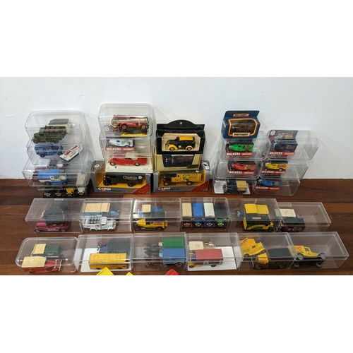 440 - A collection of diecast model vehicles to include boxed Corgi Classics No.929 and 932, various Lledo... 