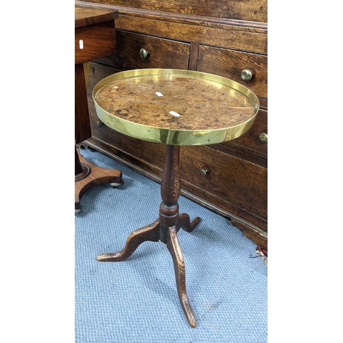 308 - A George III oak tripod occasional table having a brass band top, 62.5cm h x 57cm w
Location:A2B
If ... 