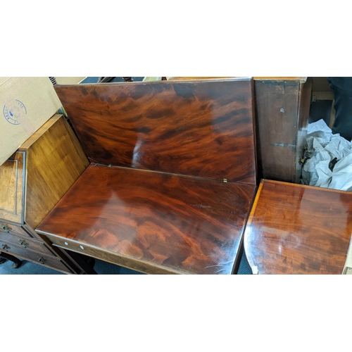 309 - A Georgian mahogany fold-over top tea table on square chamfered supports, 72cm h x 85.5cm w
Location... 