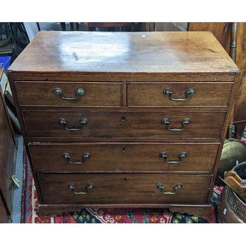 384 - An 18th century mahogany chest of drawers, provincially made with simulated pine sides and a caddy t... 