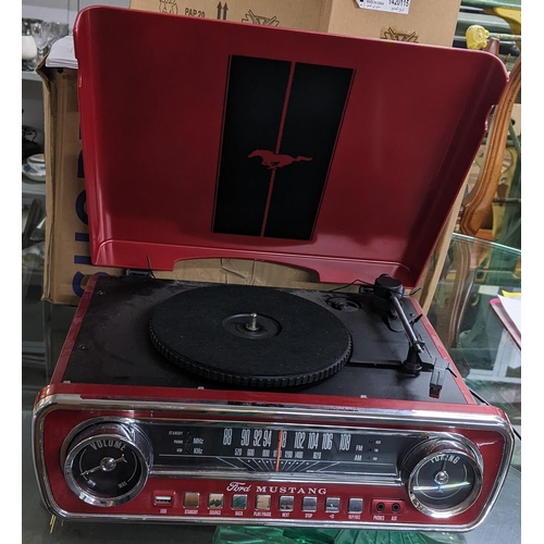 298 - An Ion Mustang record player and radio. Pat tested.
Location: G
If there is no condition report show... 