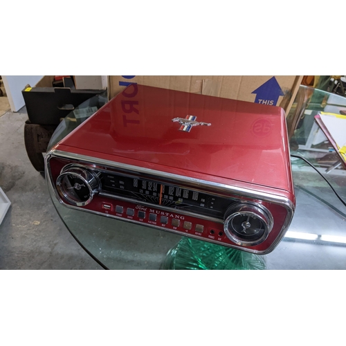 298 - An Ion Mustang record player and radio. Pat tested.
Location: G
If there is no condition report show... 